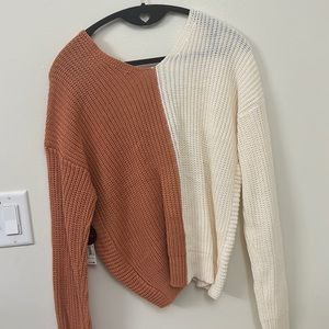 Super cute cream and pink sweater, perfect to add to your cold winter wardrobe!